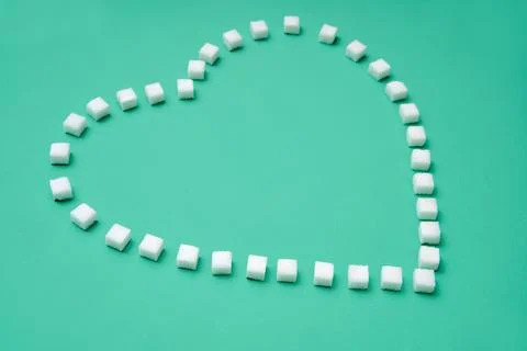 Heart shape made from sugar cubes Stock Photos