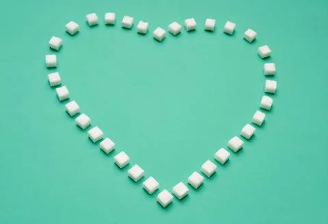 Heart shape made from sugar cubes Stock Photos