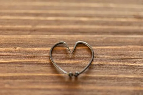 Heart Shape Made of Two Fish Hooks. Stock Photos