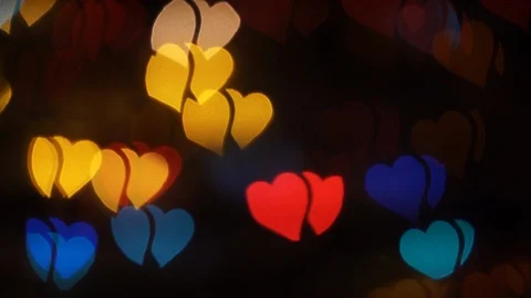 Heart shape multi colour blur bokeh abstract background. 005. 4K Stock Footage 113616525