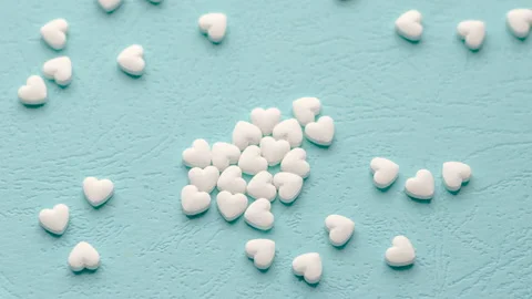 Heart shape pills tablets arranged in stop motion animation in one big heart Stock-Footage 208860323