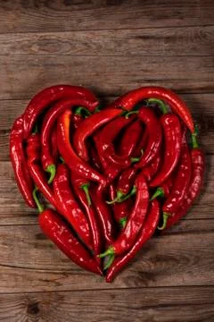 Heart shape by red pepper Stock Photos