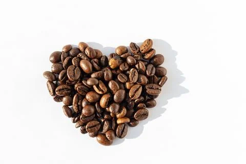 Heart shape of Robusta, Arabica coffee beans isolated on white background. I  Stock Illustration