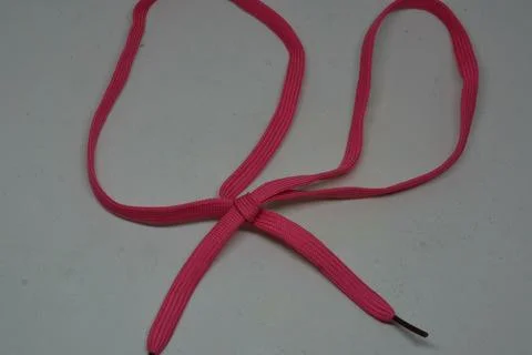 Heart shape rope knot, creative aesthetic romantic candy pink Stock Photos