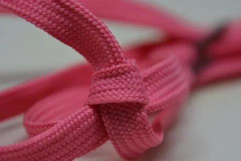 Heart shape rope knot, creative aesthetic romantic candy pink Stock Photos