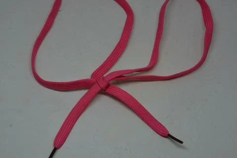 Heart shape rope knot, creative aesthetic romantic candy pink Stock-Fotos