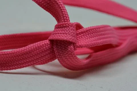 Heart shape rope knot, creative aesthetic romantic candy pink Foto stock