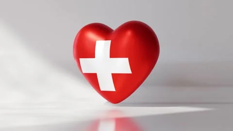 A heart shape rotates smoothly while showing the Swiss flag Stock Footage 333561118