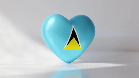 A heart shape rotating while displaying the flag of Saint Lucia. Stock Footage 333561133