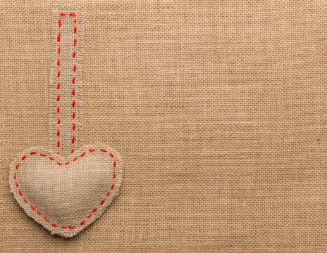 Heart Shape Sackcloth Sewing Object. Mended Burlap Background. Valentine Day Stock Photos