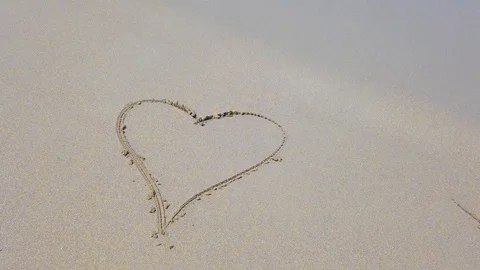 Heart shape on the sand Stock Footage 107440855