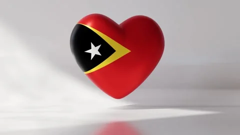 A heart shape spins smoothly while showing the national flag of East Timor Stock Footage 334740680