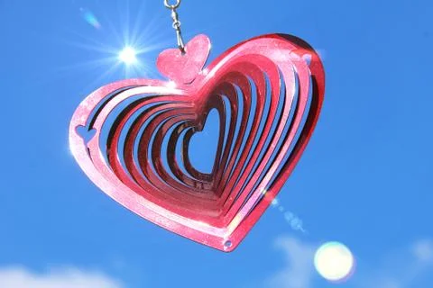 Heart shape in the sun ray Фото