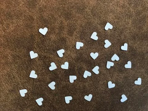 Heart shape white papers on brown fabric, "valentine's day” concept Foto stock