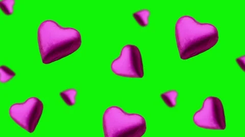 A heart shape wrapped chocolate candy flying and wiggle Stock Footage 168587105