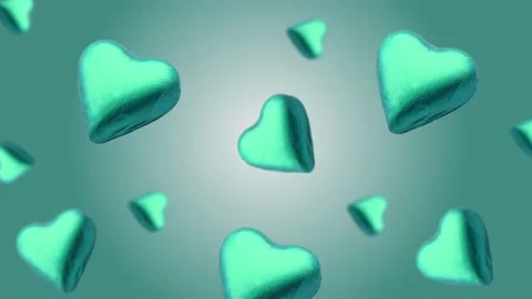 A heart shape wrapped chocolate candy flying and wiggle Video stock 168587504