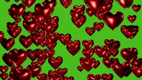 Heart-shaped balloons floating up on the greenscreen. Love symbols for Valentine Stock Footage 341031844
