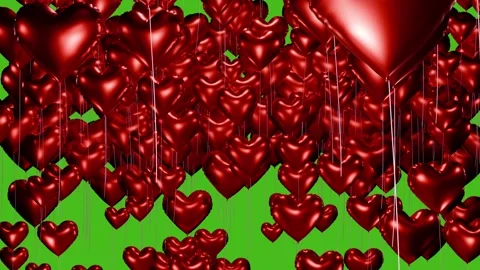 Heart-shaped balloons floating up on the greenscreen. Love symbols for Valentine Stock Footage 341031852