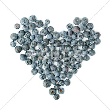 Heart shaped Bilberry or blueberry composition over isolated white background Stock Photos