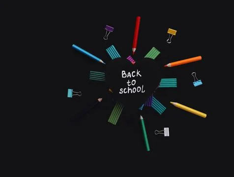 Heart shaped board with back to school inscription and multicolored plasticine Stock Photos