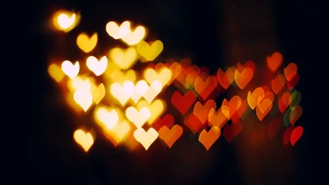 Heart shaped bokeh lights beating, growing on dark background, Valentine's day Stock Footage 85516413