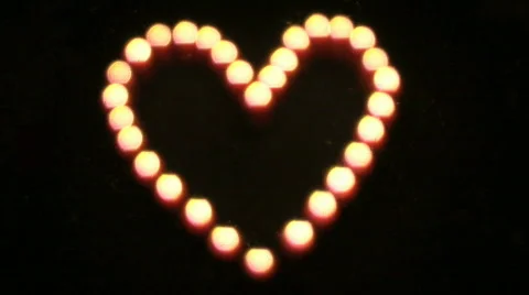 Heart shaped candles unsharp to sharp Vidéo 625400
