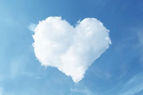 Heart shaped cloud on blue sky Stock Photos