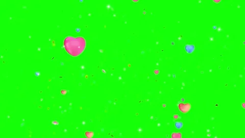 Heart-shaped confetti falling on vibrant green background with glitter and Vídeo Stock 339123636
