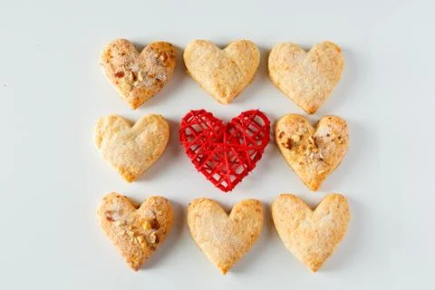 Heart shaped cookie pattern on a white background Foto stock