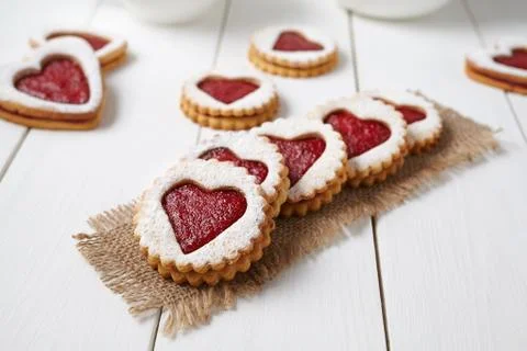 Heart shaped cookies with jam, delicious homemade holiday surprise sweet on Stock Photos