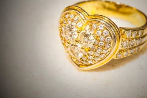 The heart-shaped diamond ring Stock Photos