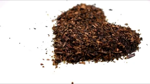 Heart shaped dried tea herbs sending a message of good health Stock Footage 262471889