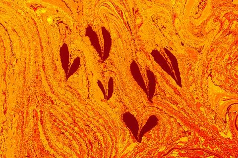 Heart-shaped elements in the bright orange background Illustrazione stock