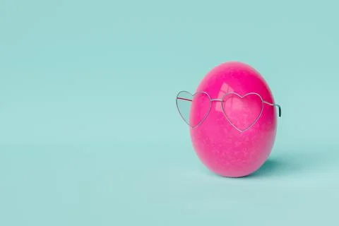 Heart shaped eyeglasses on Easter egg Stock Photos