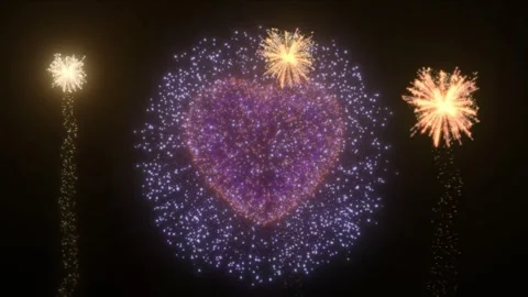 Heart shaped fireworks display exploding against dark night sky during festive Stock Footage 343805018