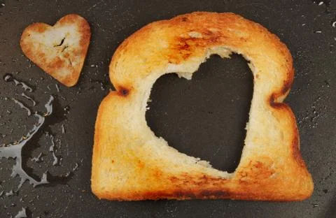 Heart shaped fried bread Stock Photos