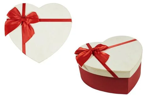 Heart-Shaped Gift Box With Red Ribbon Bow for Valentine Present and Romantic Gif Stock Photos