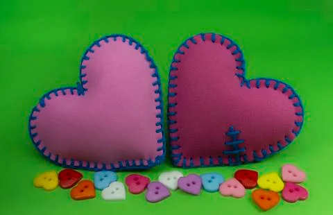 Heart shaped hand stitched textile hearts Stock Photos