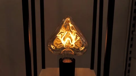 Heart shaped lamp in evening light Stock Footage 297816566