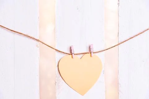 Heart shaped message card on a string Stock Photos