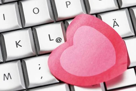 Heart-shaped notes on notebook, elevated view 写真素材