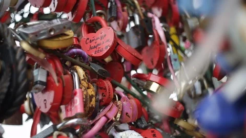 Heart shaped padlocks left by couples to celebrate wedding union Stock-Footage 107630168