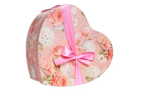 Heart-shaped present box with pink ribbon Stock Photos