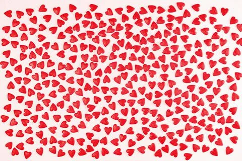 Heart shaped red sprinkles pattern background banner Stock Photos