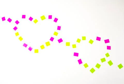 Heart shaped ribbon isolated on white background Stock Photos