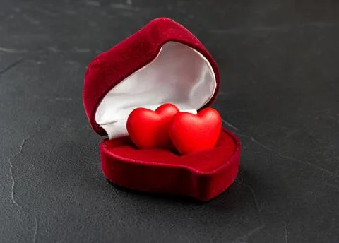 Heart-shaped ring box Stock Photos