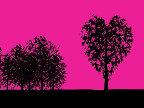 Heart shaped tree sways gently in the breeze against solid pink background. Stock Footage 71135205