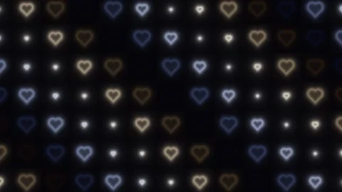 Heart shapes glowing on a dark background in a pattern Stock Footage 338031817