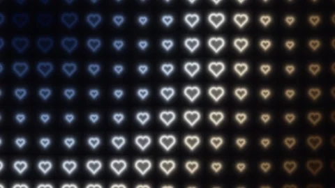Heart shapes glowing in a pattern on a dark background Stock Footage 338203341