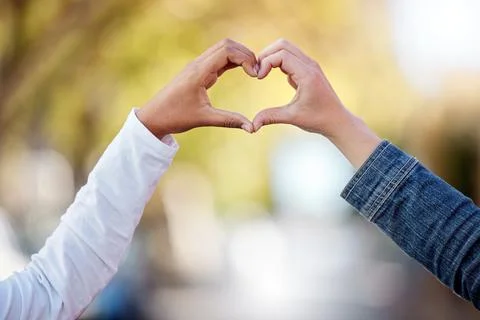 Heart sign with hands, love and couple outdoor, commitment and care in Stock Photos